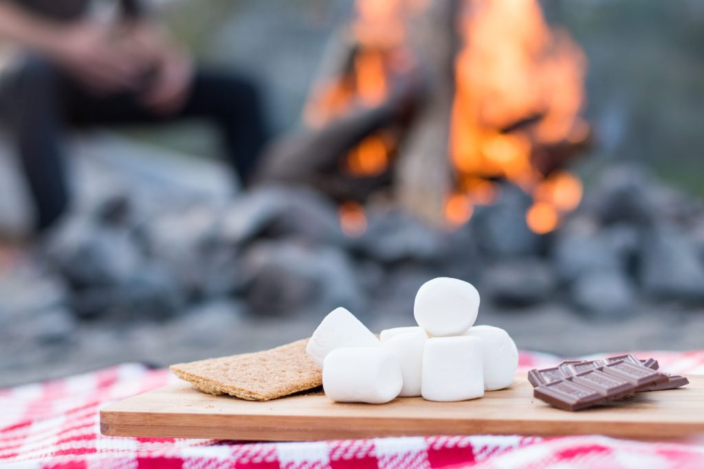Enjoy some s'mores while camping on your next date night